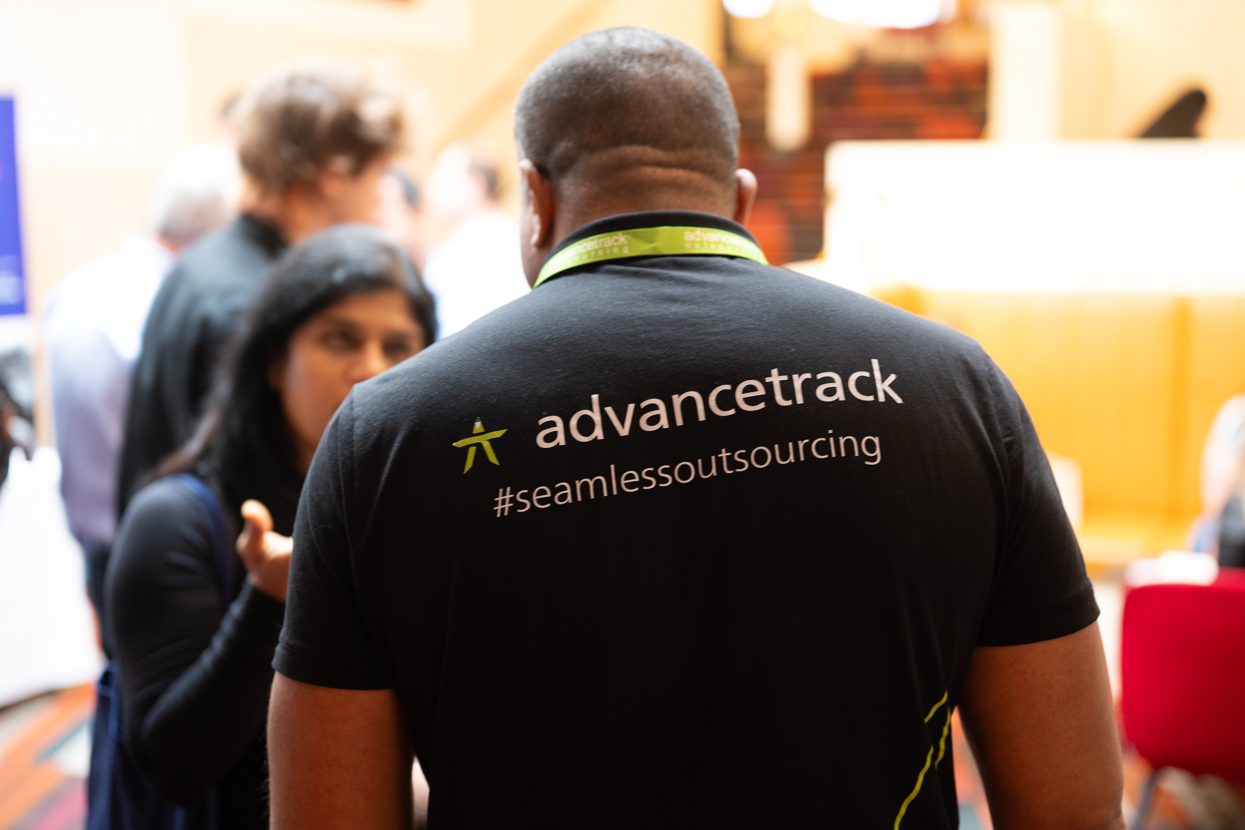 An Advancetrack team member discussing accounting outsourcing with client.